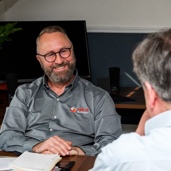 Richard in meeting with client